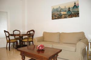 A seating area at Vatican In The Moonlight Apartment