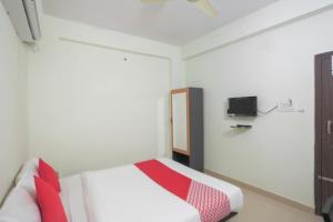 TV a/nebo společenská místnost v ubytování Oxy Hotel Prashant