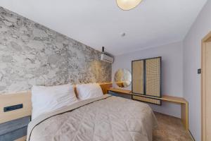 Postel nebo postele na pokoji v ubytování Hotel Senec Aqua Resort - Family friendly