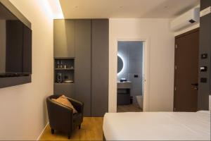 Postel nebo postele na pokoji v ubytování Hotel Acquamatta