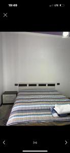 Ένα ή περισσότερα κρεβάτια σε δωμάτιο στο Paris