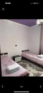 Ένα ή περισσότερα κρεβάτια σε δωμάτιο στο Paris