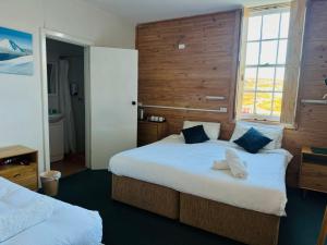 Letto o letti in una camera di Sponars Chalet