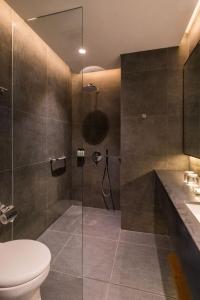 Ένα μπάνιο στο Hotel Santika Bangka