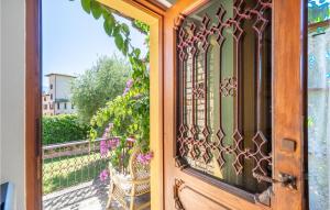 a wooden door with a view of a balcony at Villa Sista in Roina