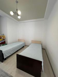 Katil atau katil-katil dalam bilik di Квартира Взморье +11 gambar
