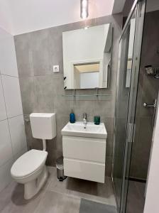 Koupelna v ubytování Minimalistic Apartment & Studio in Heart street