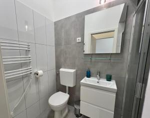 Koupelna v ubytování Minimalistic Apartment & Studio in Heart street