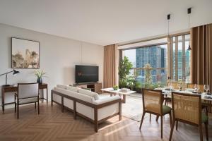 TV a/nebo společenská místnost v ubytování Epic Tower Swiss-Belresidences Hanoi