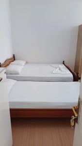 Postel nebo postele na pokoji v ubytování Hotel Justinian