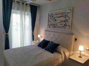 Postel nebo postele na pokoji v ubytování Casita playa