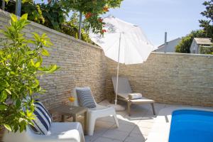 Bazén v ubytovaní Apartments & rooms Stella Adriatica alebo v jeho blízkosti