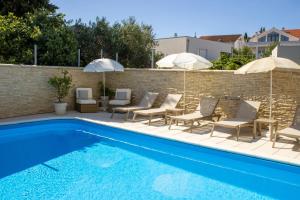 Bazén v ubytovaní Apartments & rooms Stella Adriatica alebo v jeho blízkosti