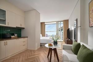 TV a/nebo společenská místnost v ubytování Epic Tower Swiss-Belresidences Hanoi