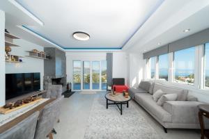Χώρος καθιστικού στο Villa Orama