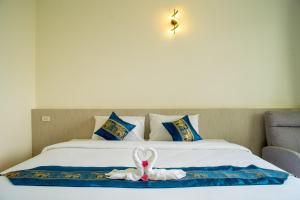 Puean Chang Resort Phuket客房内的一张或多张床位