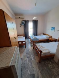 Postel nebo postele na pokoji v ubytování Golden Beach Sea View