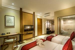 TV a/nebo společenská místnost v ubytování Anumana Ubud Hotel