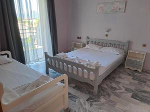 Postel nebo postele na pokoji v ubytování Golden Beach Sea View