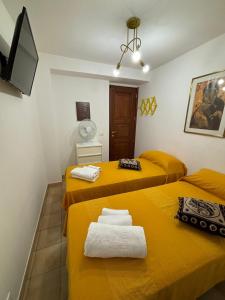 Ένα ή περισσότερα κρεβάτια σε δωμάτιο στο Porta Trapani Guest House