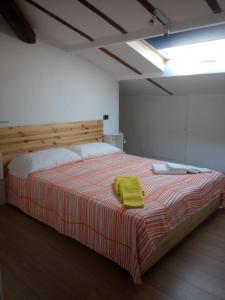 Postel nebo postele na pokoji v ubytování Alla Torre Con Vista