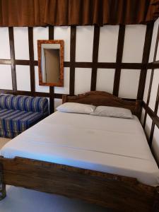 Postel nebo postele na pokoji v ubytování Yuken Mari Beach Resort Panglao