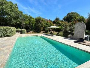 Πισίνα στο ή κοντά στο Appartement avec piscine privée Porticcio