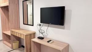 TV a/nebo společenská místnost v ubytování New YX oasis hotel 新悦喜雅居自助酒店
