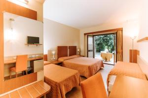 TV a/nebo společenská místnost v ubytování Valtur Otium Resort