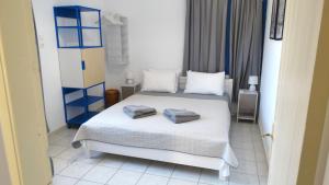 Posteľ alebo postele v izbe v ubytovaní Captain's Beach Apartments