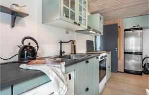 Kuchyň nebo kuchyňský kout v ubytování Holiday Home Ørnevej Vejers Strand V + 18 fotografií