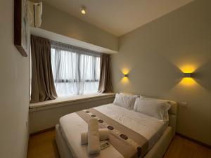 Katil atau katil-katil dalam bilik di Pullman BayView-a Luxirious Aparthotel at DangaBay