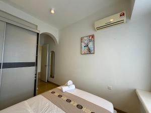 Katil atau katil-katil dalam bilik di Pullman BayView-a Luxirious Aparthotel at DangaBay