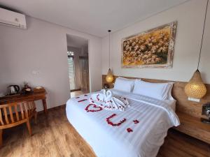 Postel nebo postele na pokoji v ubytování Graha Shanti Guest House + 37 fotografií