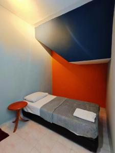 Postel nebo postele na pokoji v ubytování My Segamat Homestay