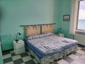 En eller flere senge i et værelse på La Bouganville Beatiful Sea view