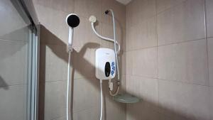 Koupelna v ubytování New YX oasis hotel 新悦喜雅居自助酒店 + 33 fotografií