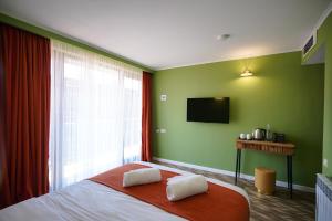 Postel nebo postele na pokoji v ubytování Station 22 Hotel