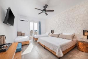 Cama ou camas em um quarto em Summer Village of Hippokrates - Adults only