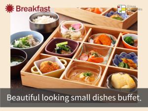 a tray of food with small dishes in it at Hotel Musse Ginza Meitetsu in Tokyo