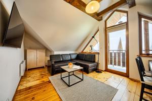 Televízia a/alebo spoločenská miestnosť v ubytovaní VisitZakopane- Mallorca Apartment