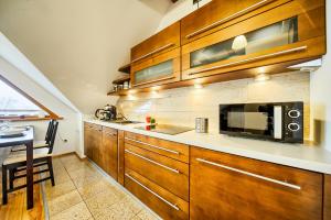Kuchnia lub aneks kuchenny w obiekcie VisitZakopane- Mallorca Apartment