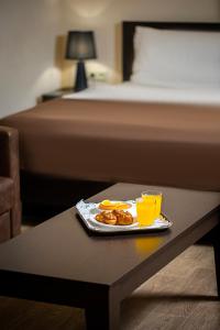 Voodi või voodid majutusasutuse Boutique Living Hotel toas