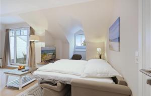 Ένα ή περισσότερα κρεβάτια σε δωμάτιο στο Baltischer Hof Apartment 64