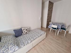 Postel nebo postele na pokoji v ubytování Relax Rosolina Mare + 7 fotografií