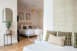 Ένα ή περισσότερα κρεβάτια σε δωμάτιο στο L'Impérium Suite - Les Halles - Narbonne