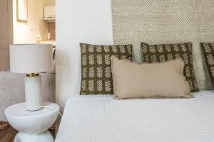 Ένα ή περισσότερα κρεβάτια σε δωμάτιο στο L'Impérium Suite - Les Halles - Narbonne