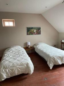 Postel nebo postele na pokoji v ubytování Appartement spacieux au domaine