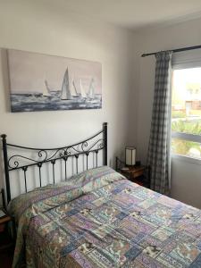 En eller flere senge i et værelse på Casa Marilú