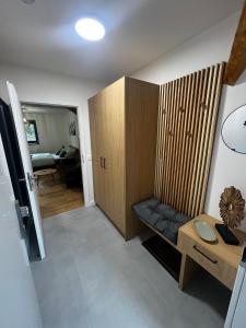 Postel nebo postele na pokoji v ubytování Apartmány v Javorné na Šumavě